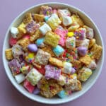 easy Easter Bunny Chow is a no-bake treat bursting with pastel colors, crunchy cereal, white chocolate, and spring candies—ready in just 30 minutes