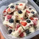 Frozen yogurt bites are the easiest healthy snack you'll ever make! Creamy Greek yogurt mixed with honey and vanilla, studded with fresh fruit