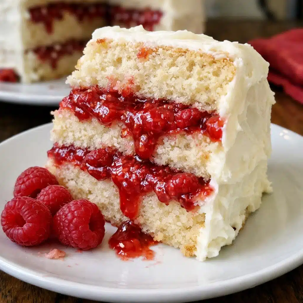 Homemade raspberry cake filling with fresh berry flavor perfect for layering between vanilla or white chocolate cakes