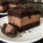 Chocolate mousse filling with silky whipped texture perfect for layer cakes, cupcakes, or elegant dessert cups